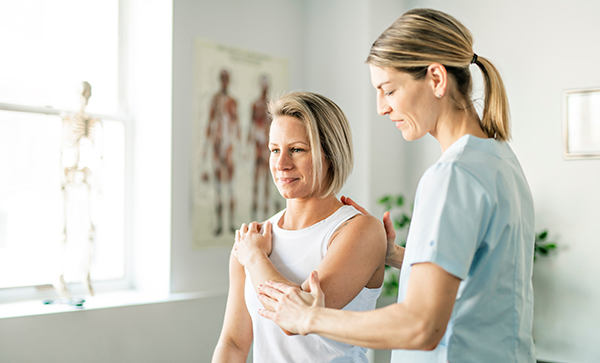 physical therapist with patient