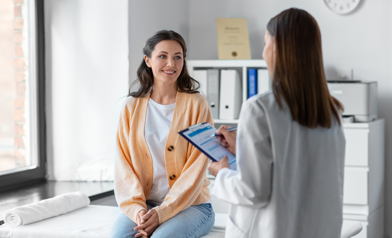 woman visiting with doctor