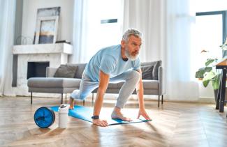 Older man stretching and exercising