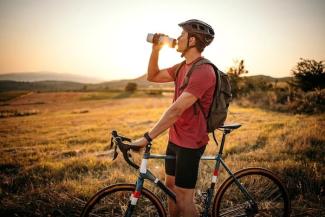 Man taking a break from riding bike