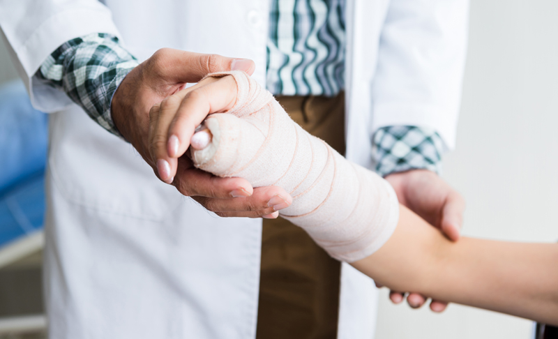 person with cast on arm